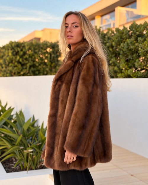 Classic brown mink coat, side view