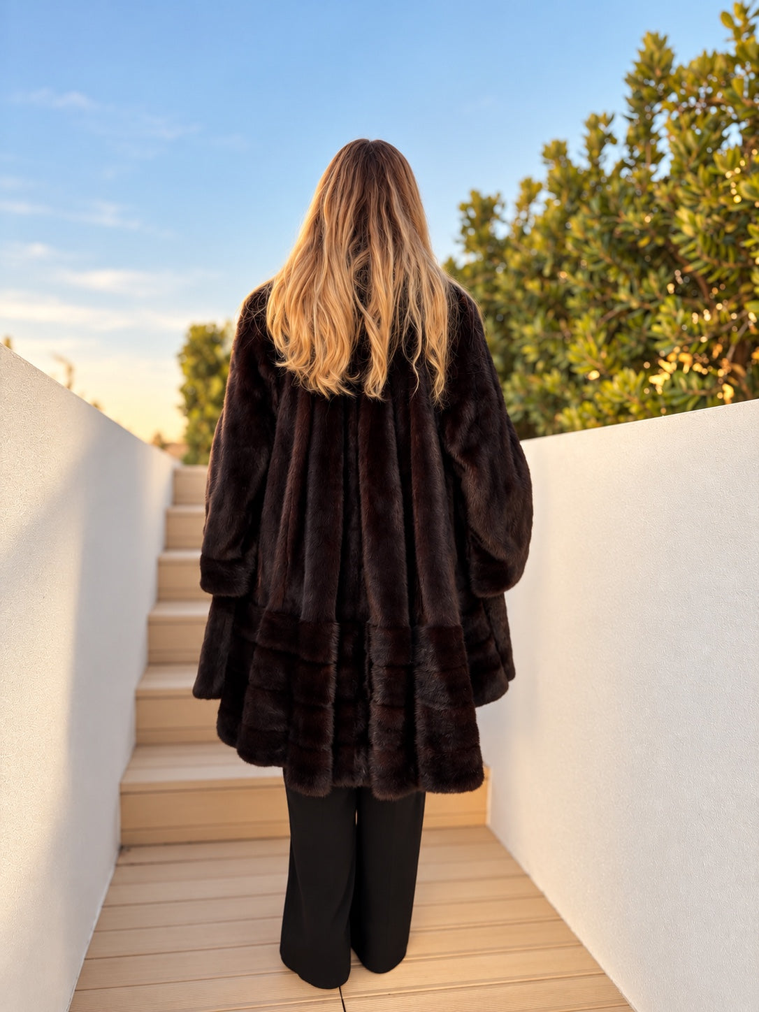 Dark brown oversized mink coat, back with horizontal fur detail